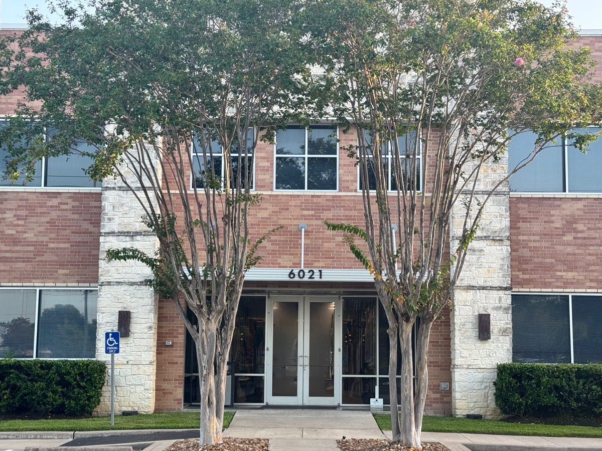 The front entrance at 6021 Fairmont Pkwy