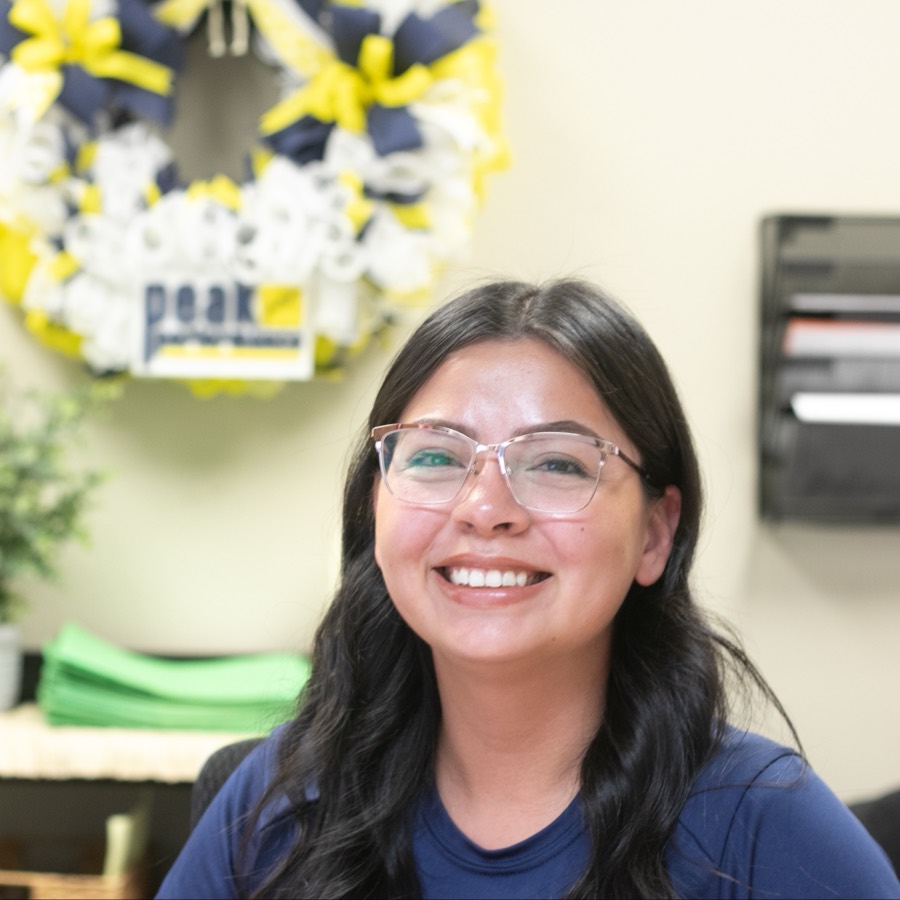 Karen Alvarez at the front desk
